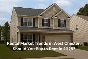 A suburban house with beige siding, black shutters, and a two-car garage. Text overlay reads, “Rental Market Trends in West Chester: Should You Buy to Rent in 2025?”