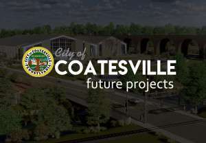 A modern cityscape with a large, sleek building and an arched bridge surrounded by greenery. Overlay text reads "City of Coatesville Future Projects."